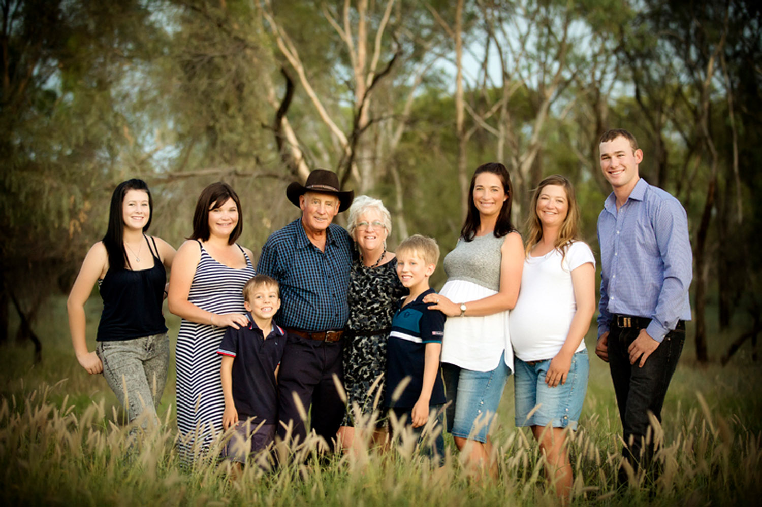 family, generational image in bush setting