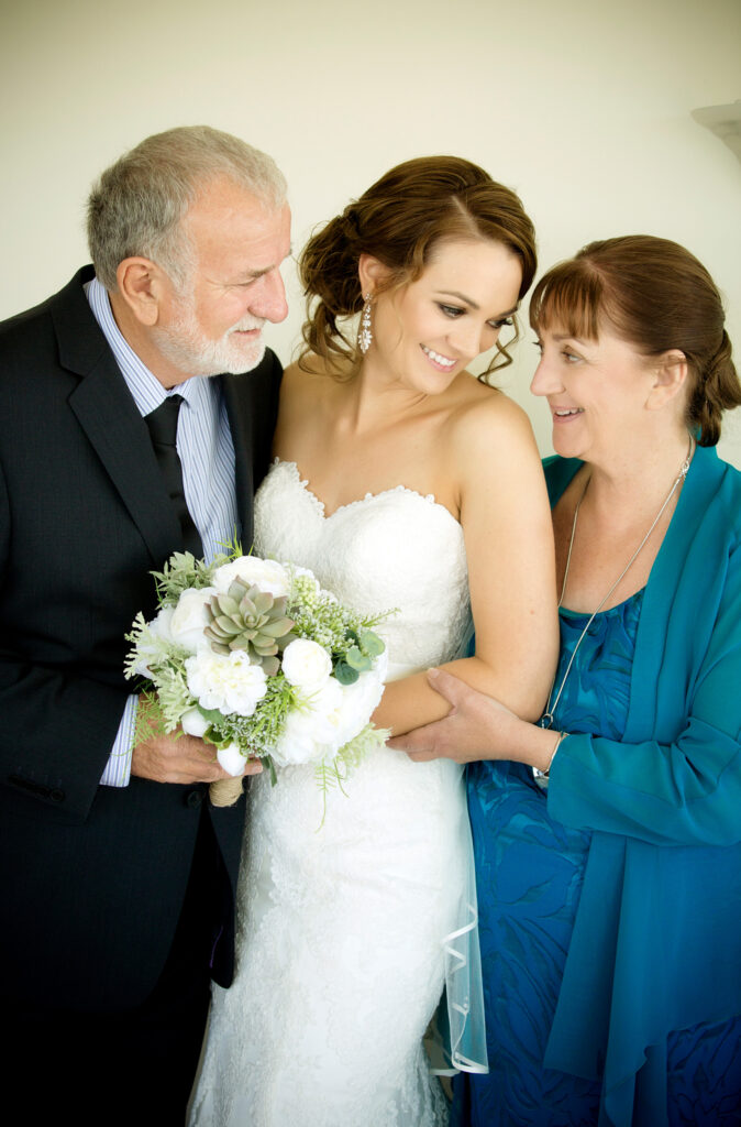 connection between bride and parents on wedding day