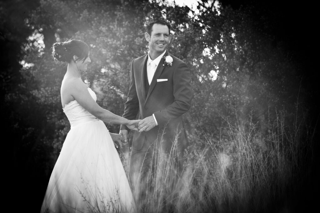 bride and groom laughing together