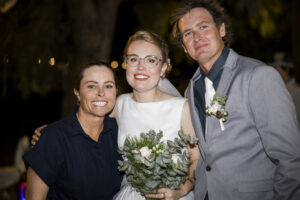photographer with bridal couple
