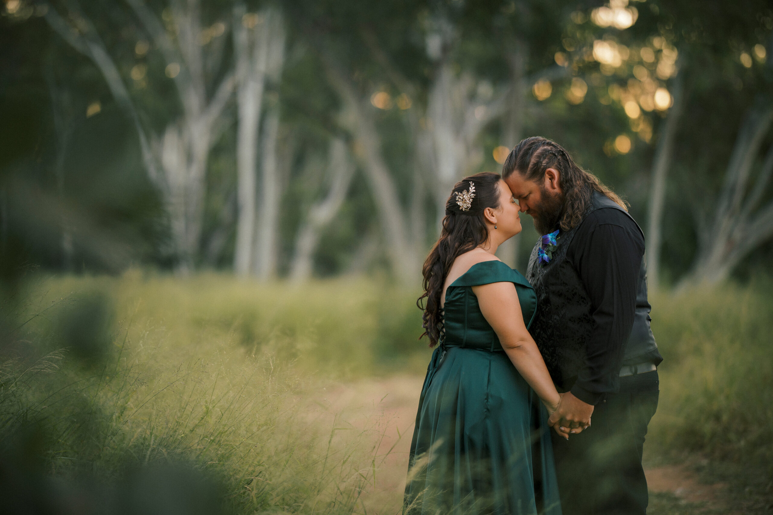 Bride and groom in rural setting